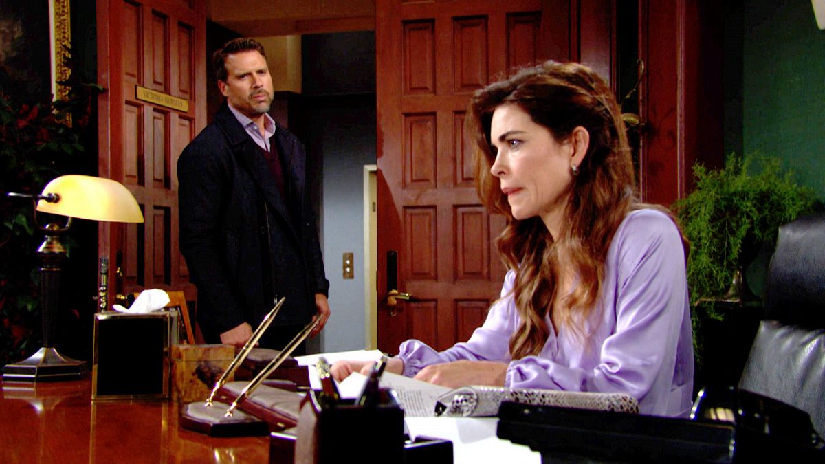 Joshua Morrow and Amelia Heinle as Nick and Victoria in an office in The Young and the Restless