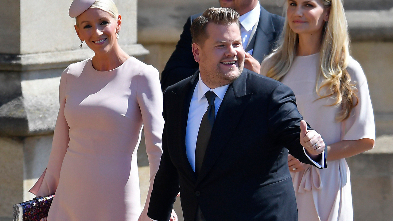 British presenter James Corden and Julia Carey arrive for the wedding ceremony of Britain&#039;s Prince Harry, Duke of Sussex and US actress Meghan Markle at St George&#039;s Chapel, Windsor Castle, in Windsor, on May 19, 2018. 