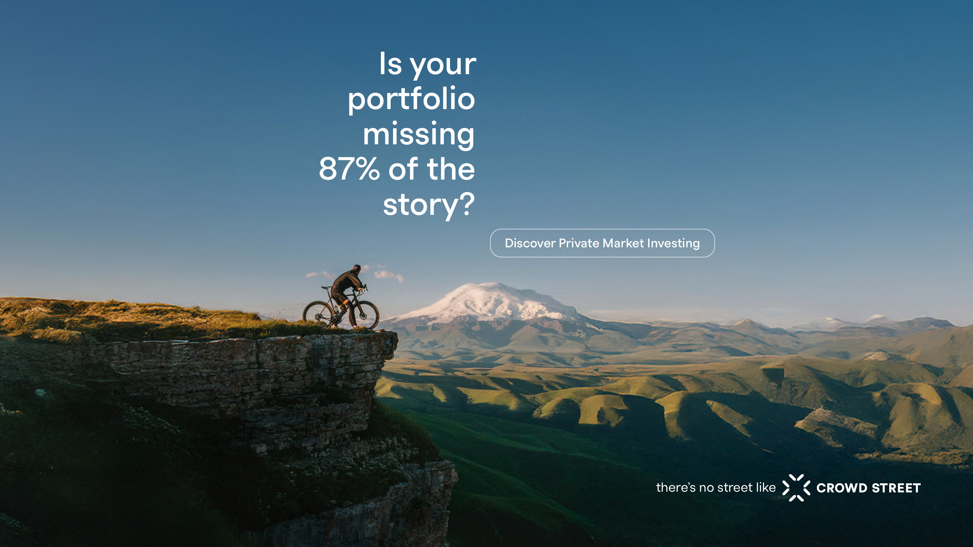 Mountain biker overlooking fields