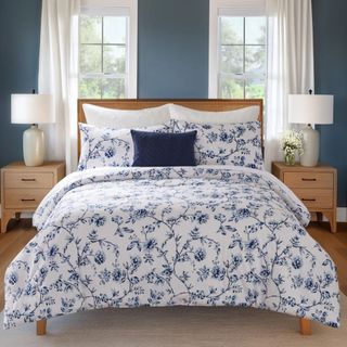 blue and white floral bedding in bedroom 