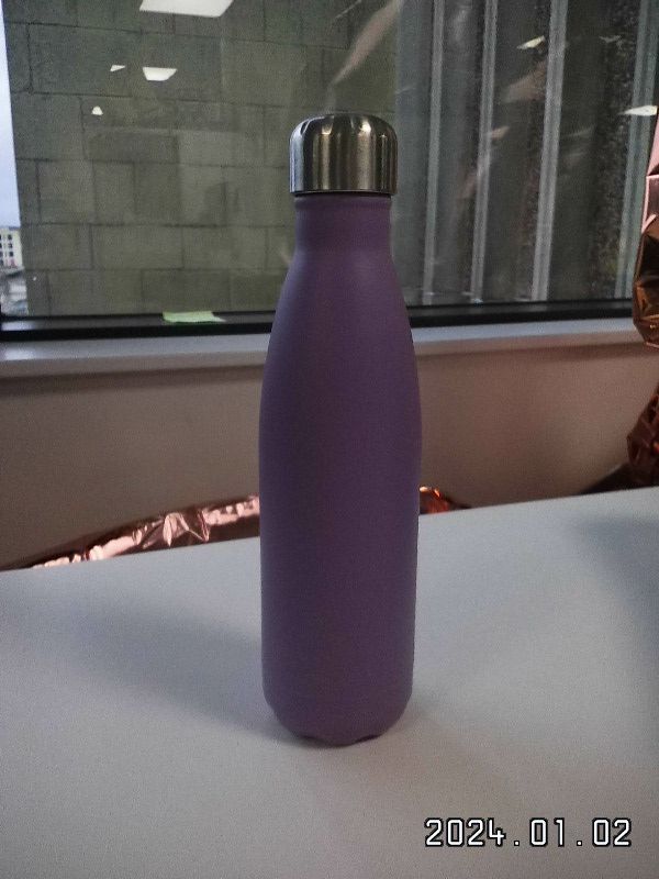 A purple Chillys bottle shot on the Leica Sofort 2