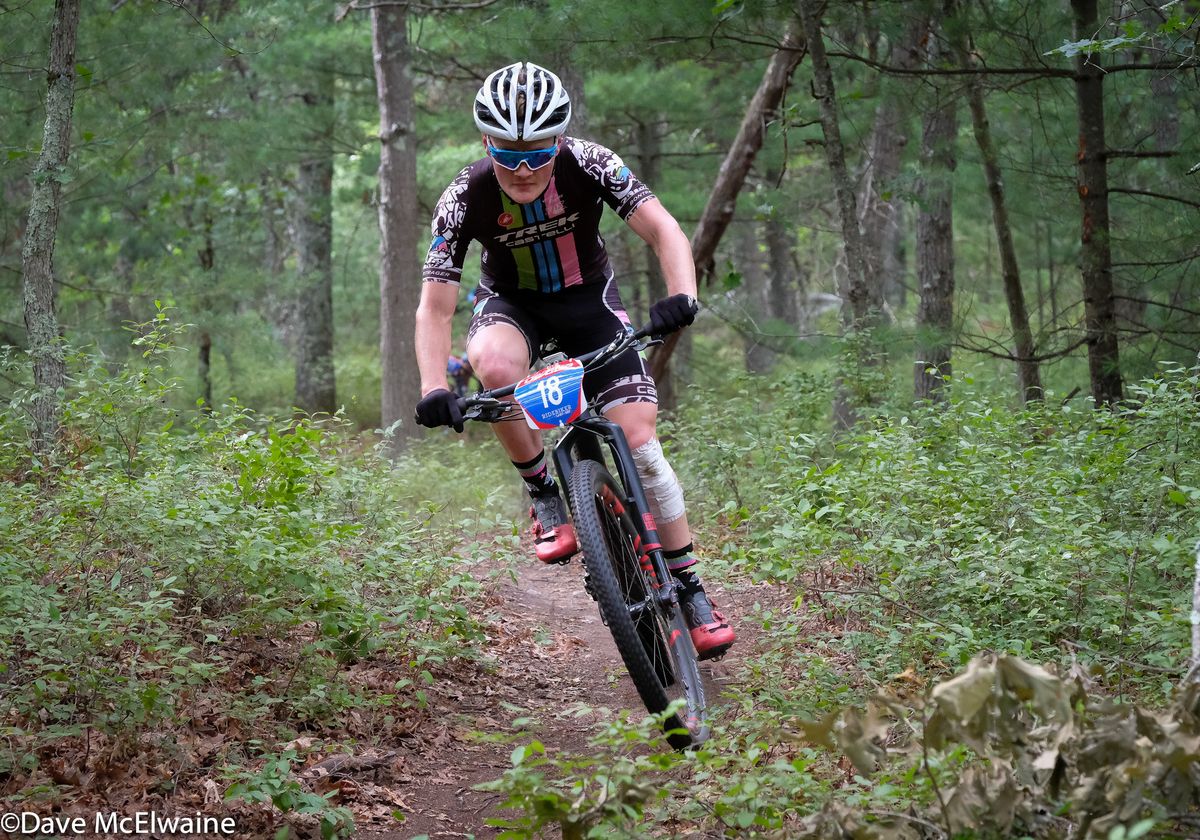 Sandy Floren riding just behind the leaders during lap three
