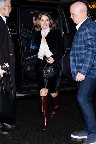 A photo of Keira Knightley carrying a black Chanel bubble flap bag.