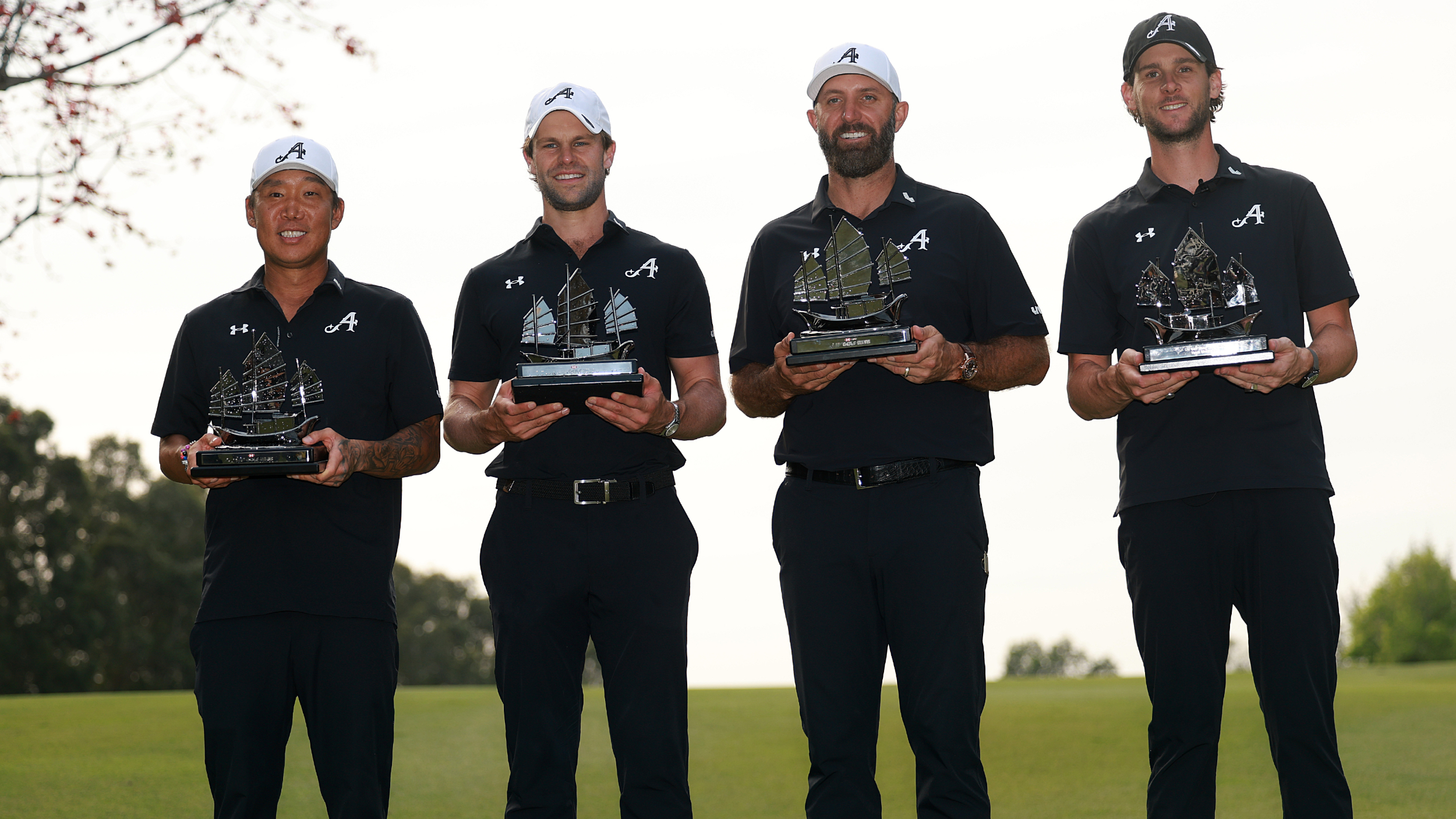 4Aces GC holding LIV Golf Hong Kong trophies