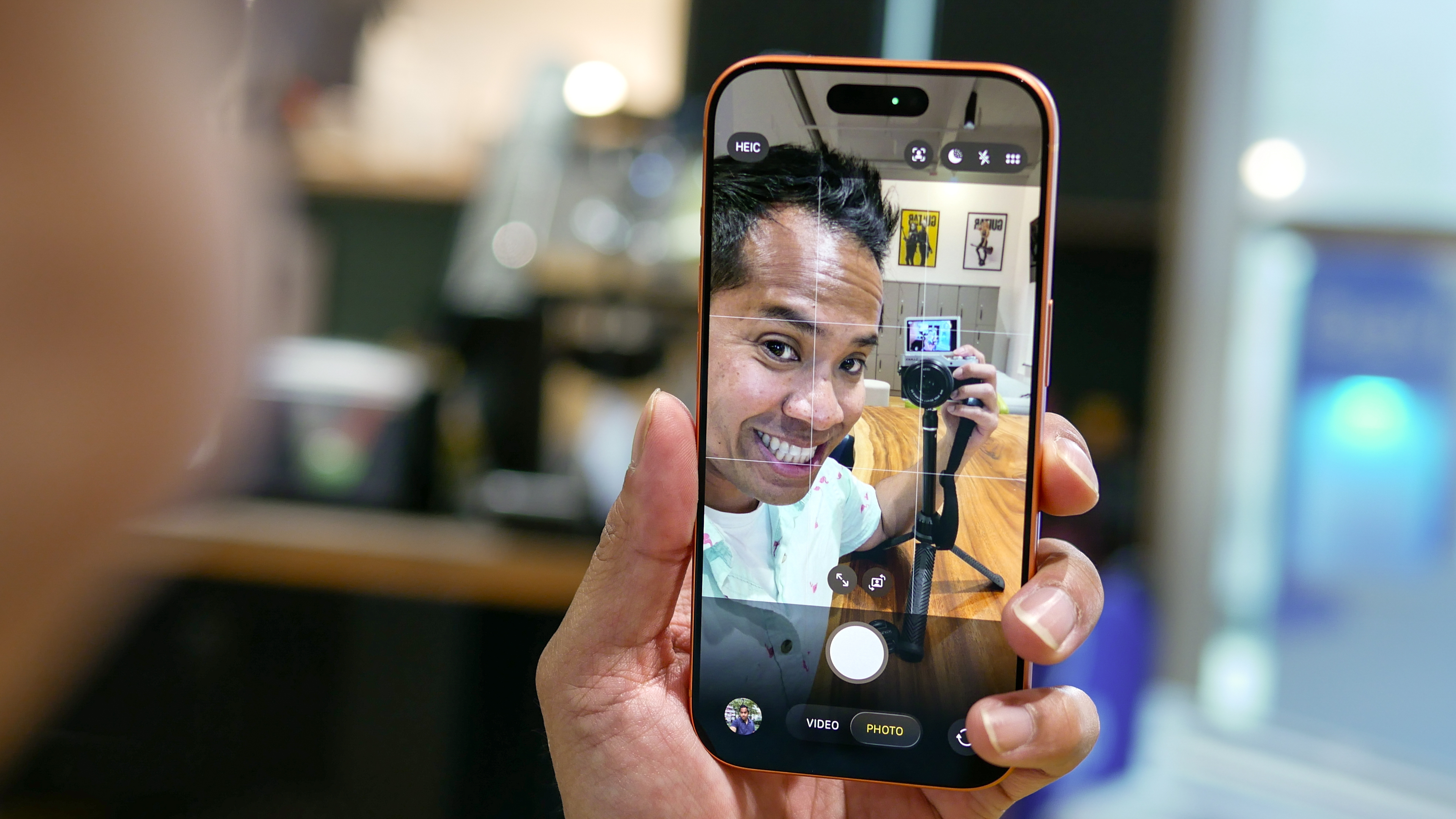 Taking a selfie with the iPhone 17 Center Stage camera.