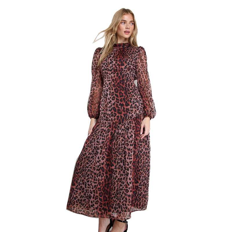 Model wearing a pink and red leopard print dress