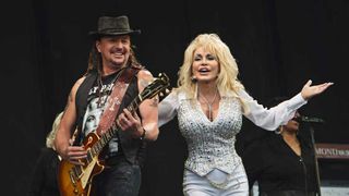 Richie Sambora and Dolly Parton onstage at Glastonbury in 2014