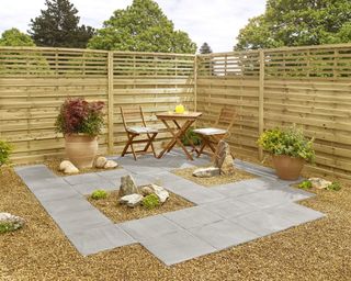 gravel garden with a paved patio area