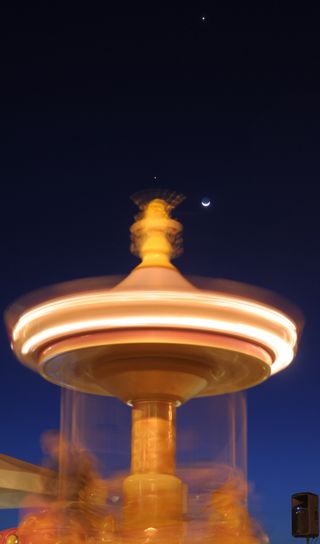 Jupiter, Venus and the Moon Riding Along on a Carousel