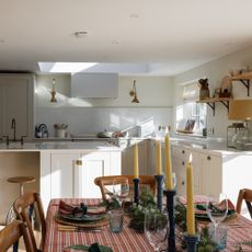 kitchen with farmhouse table decorated for christmas