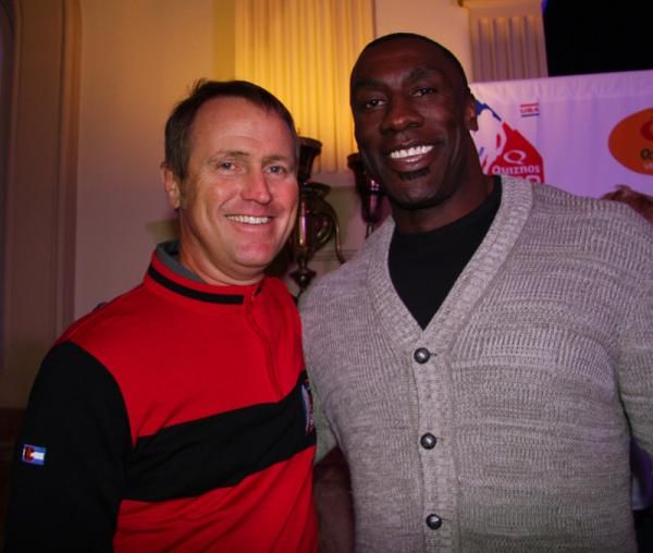 Chris Carmichael poses with Shannon Sharpe