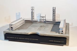 book with concrete structure on top