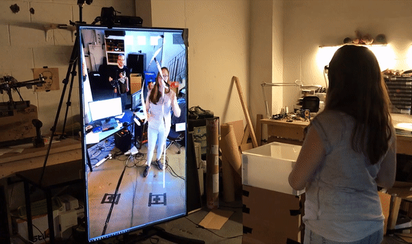 GIF of woman interacting with AR mirror