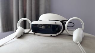 DPVR E4 virtual reality headset with controllers from various angles.