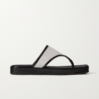 BY FAR Otto glossed-leather and linen flip flops, Now £122.50 Was £245 (50% off)
