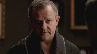 Hugh Bonneville has a conversation in his robe in Downton Abbey.