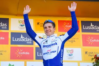 Deceuninck-QuickStep’s Remco Evenepoel steps onto the podium to be crowned the overall winner of the 2020 Volta ao Algarve