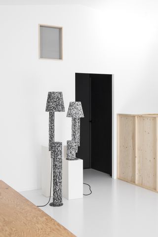 Two lamps in black and white terrazzo material