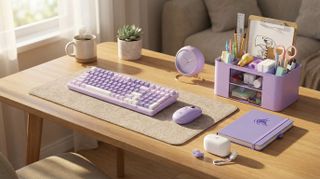 A selection of lilac-themed home office supplies on a desk