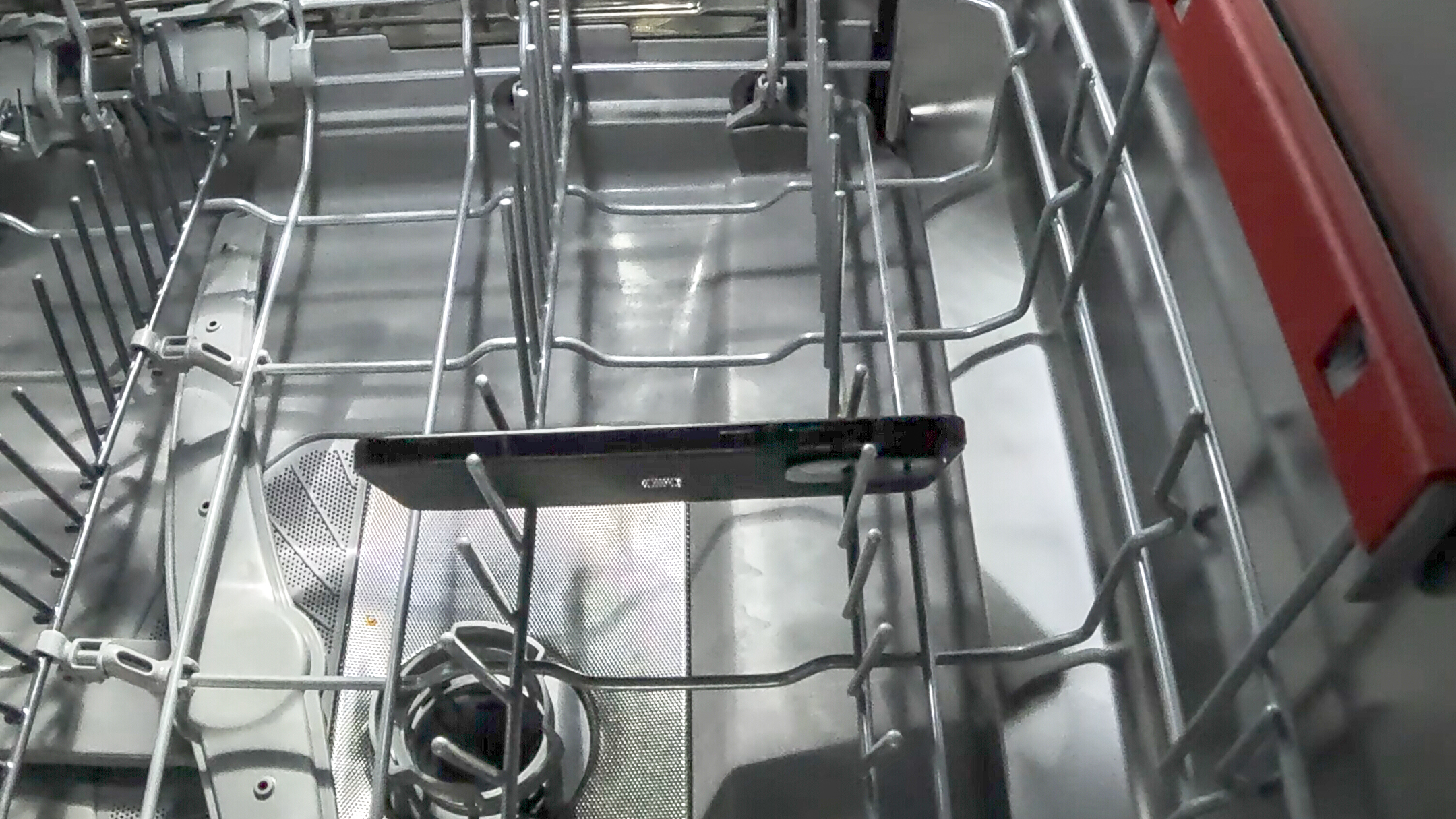 OnePlus 15R in a dishwasher pre-cycle