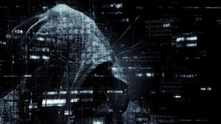 Shady hooded figure with fragments of text - voice biometrics defense against deepfakes