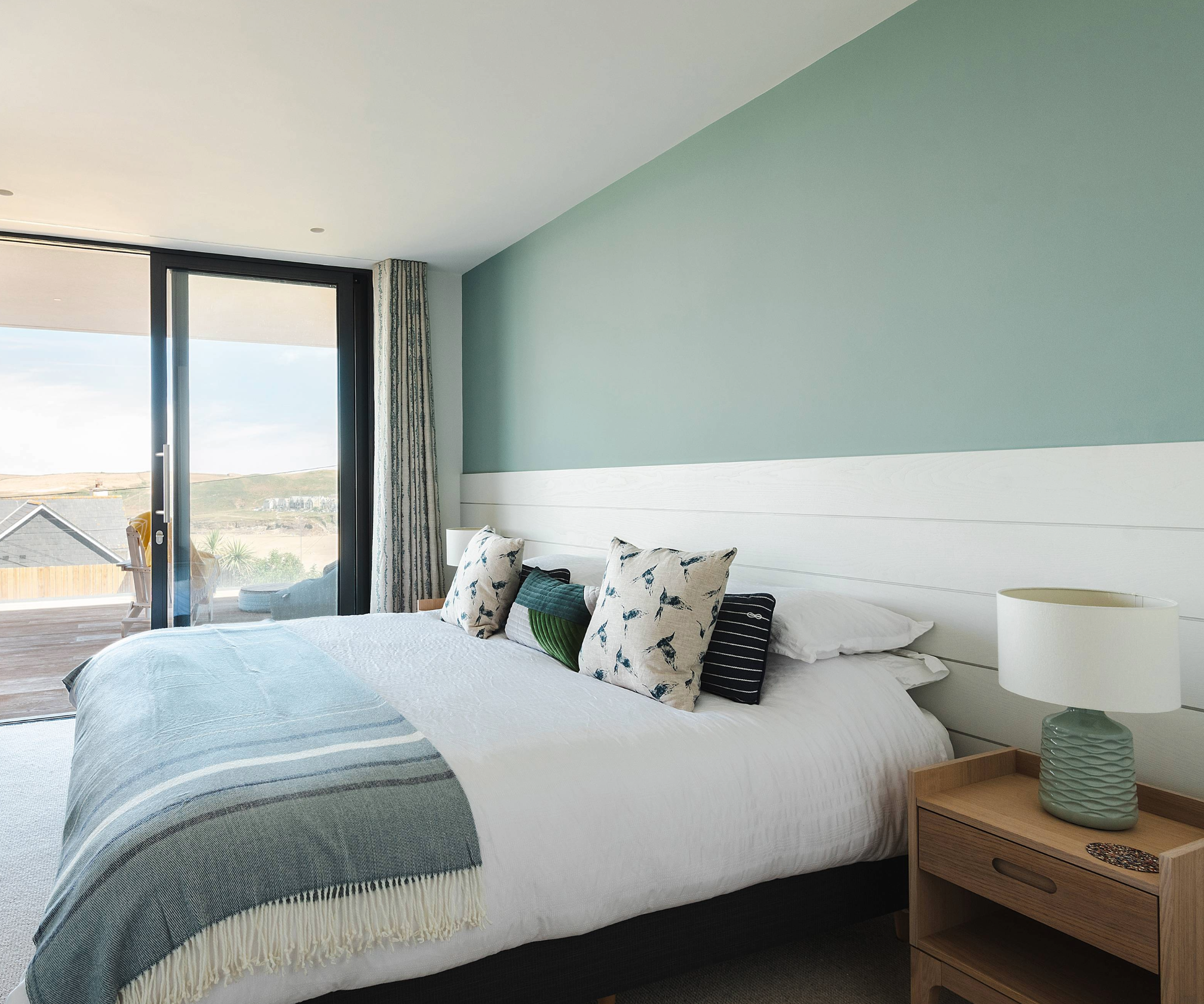 Headboard idea that extends across the wall