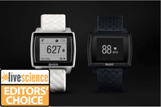 The Basis Peak fitness tracker, shown in white and black