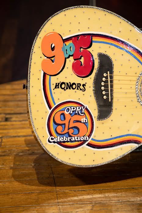 Dolly Parton is auctioning a "9 to 5" Oscar Schmidt guitar