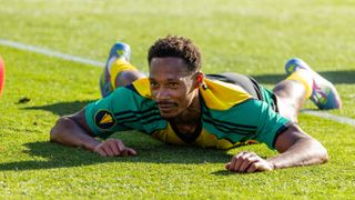 Ethan Pinnock #5 of Jamaica falls to the ground after contact with Matthias Phaeton #10 of Guadeloupe during a 2025 Concacaf Gold Cup Group C match on June 20, 2025 at PayPal Park in San Jose, CA.