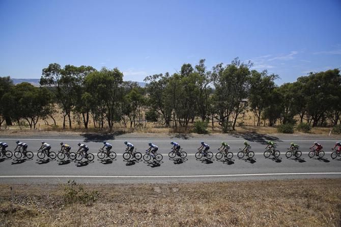 The peloton spread out on the wide road