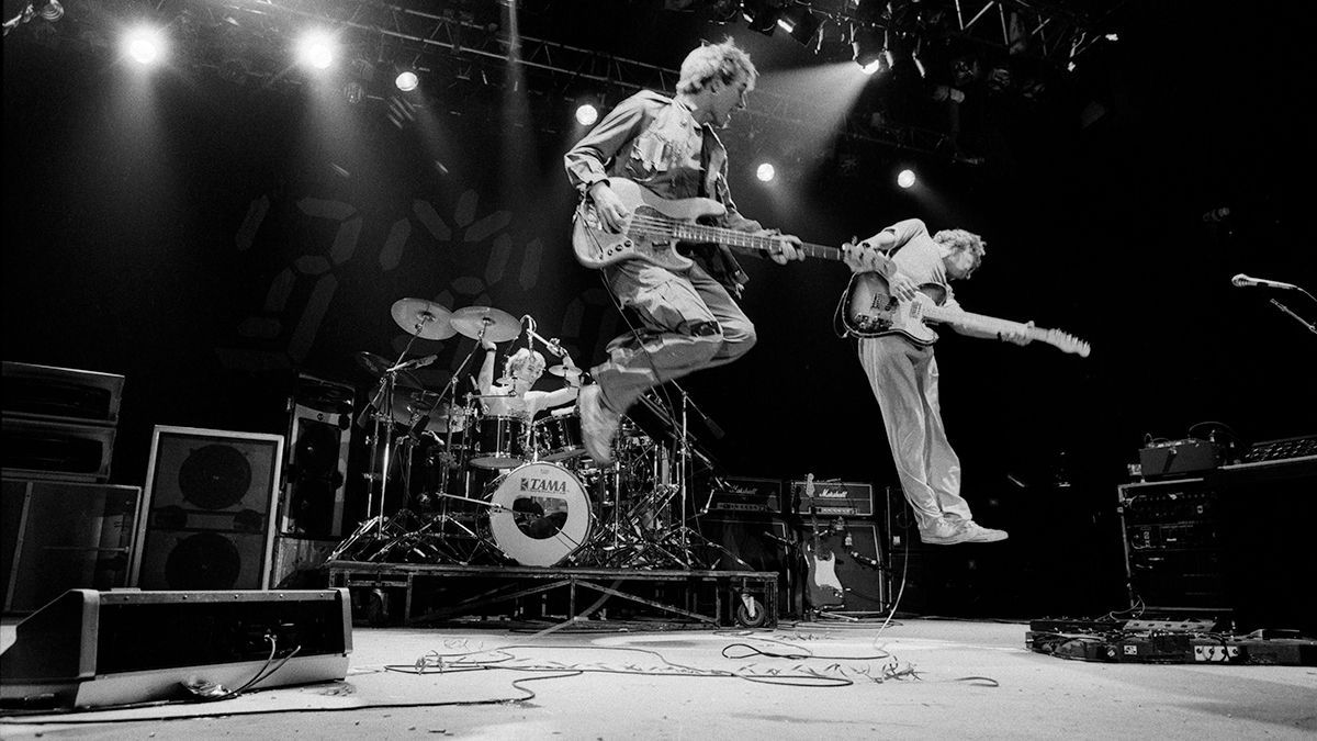 Stewart Copeland, Sting and Andy Summers of The Police perform on stage, United Kingdom, 1981