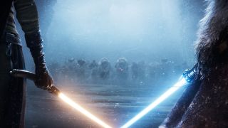 On either side of the image there is a close up of a person wielding a lightsaber, pointing downwards. In the distance there is a large, charging army coming towards them. There is a swirl of snow in the air, and everyone is wearing warm clothing.