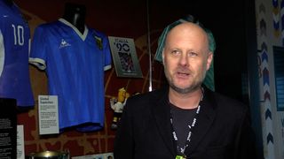 National Football Museum spokesperson Dickie Felton with the shirt Diego Maradona wore when he played England in 1986
