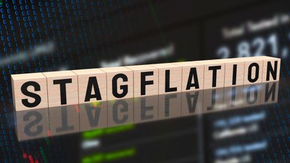 the word "stagflation" spelled out on wooden blocks with stock chart in the background