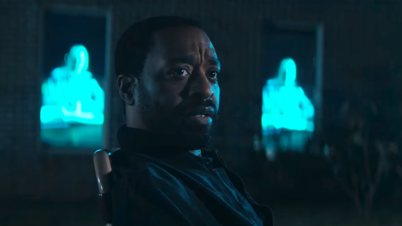 Chiwetel Ejiofor looking over while outside with Karen Gillan in The Life Of Chuck Act 3