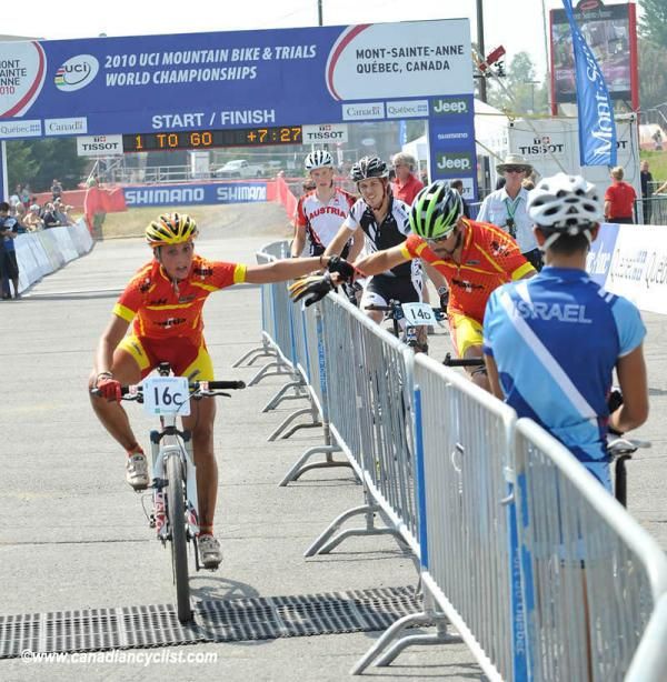 Anna Villar Argente (Spain) hands off the Jose Antonio Hermida