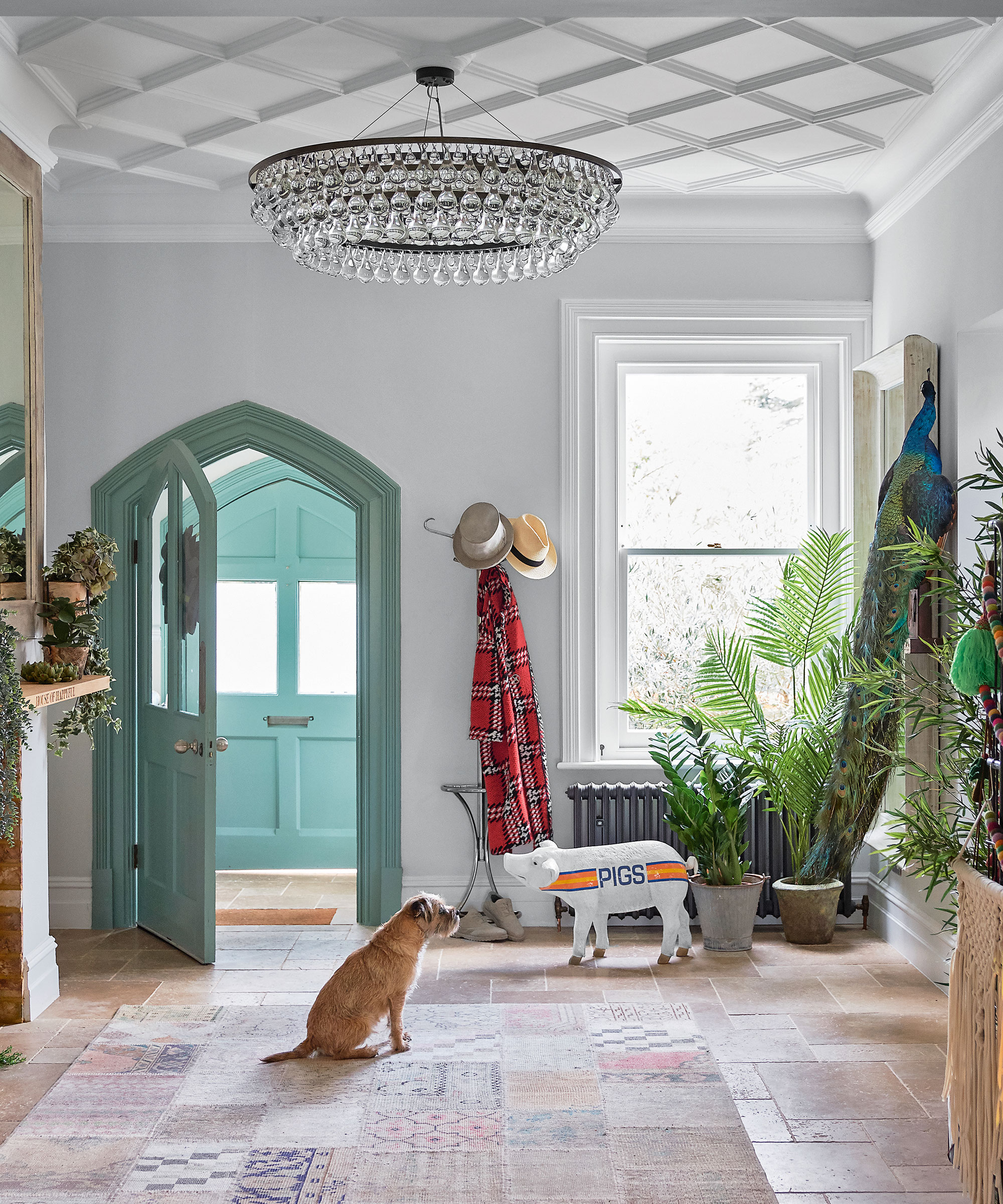 Hallway with white walls and blue painted door frame