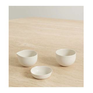 porcelain bowl, jug and dish in cream color, minimalist shape