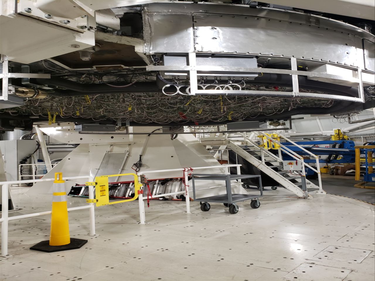 A look at the 76-foot telescope. The primary mirror sits above the metallic bottom surface. Near the top is the heat sink assembly that redirects most of the heat from the sunlight.