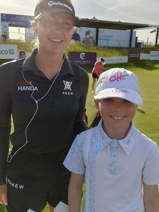 Charley Hull and nine-year-old Esme