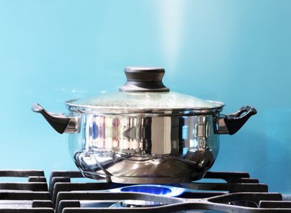 saucepan with rising steam