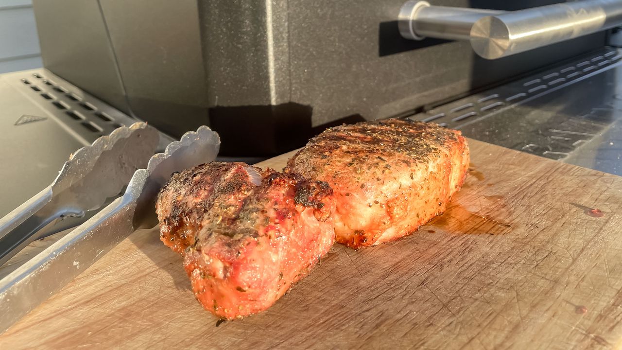 Meat being cooked on the Masterbuilt Gravity Series 1150