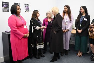 Queen Camilla speakig to women at the Asian Women's Resource Centre in February 2025