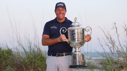 Phil Mickelson holds the Wanamaker Trophy