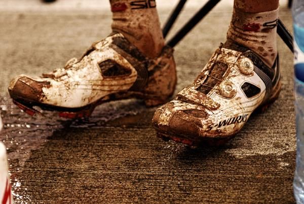 The muddy shoes of Rebecca Rusch after La Ruta