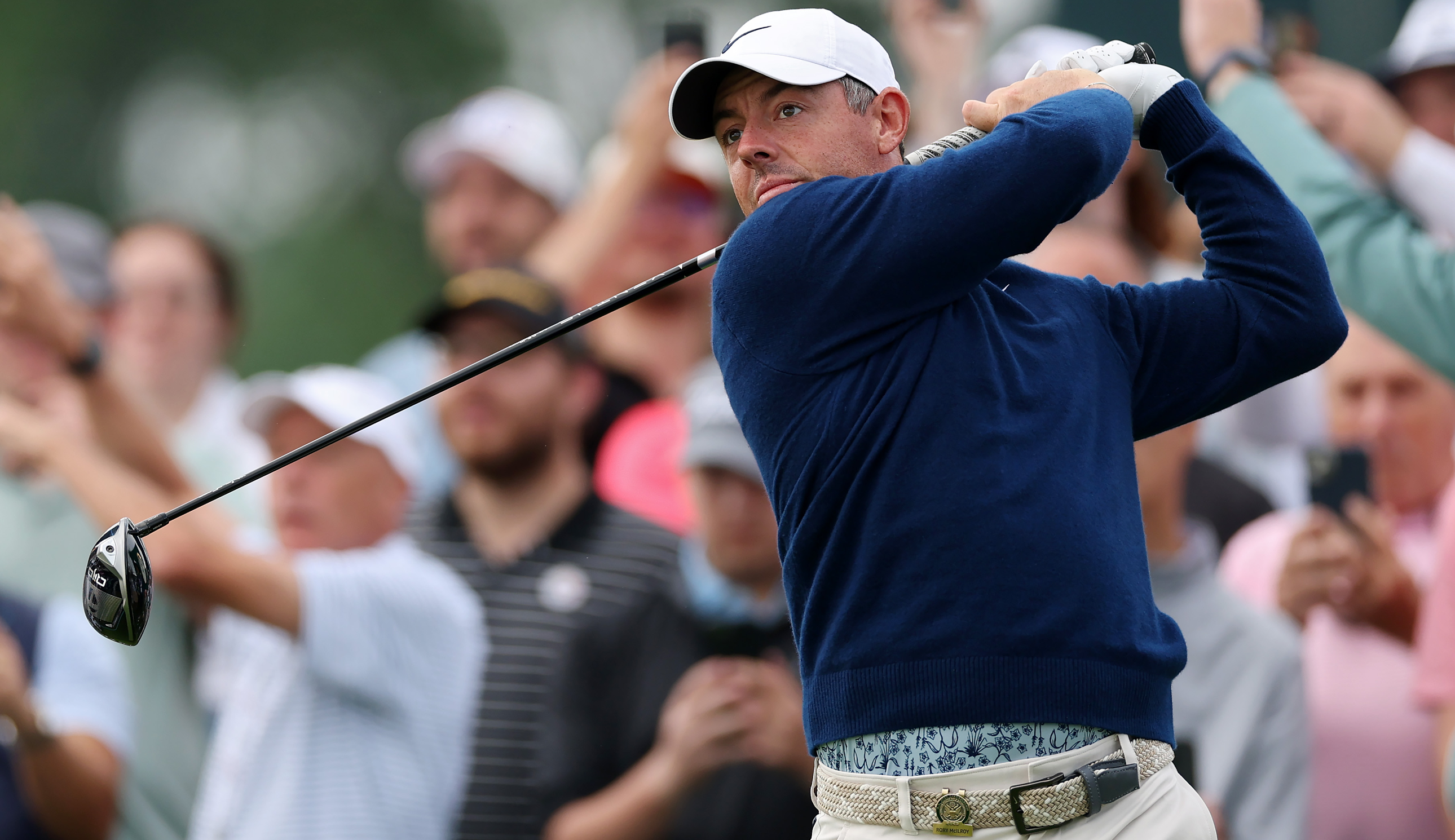 Rory McIlroy strikes a driver off the tee
