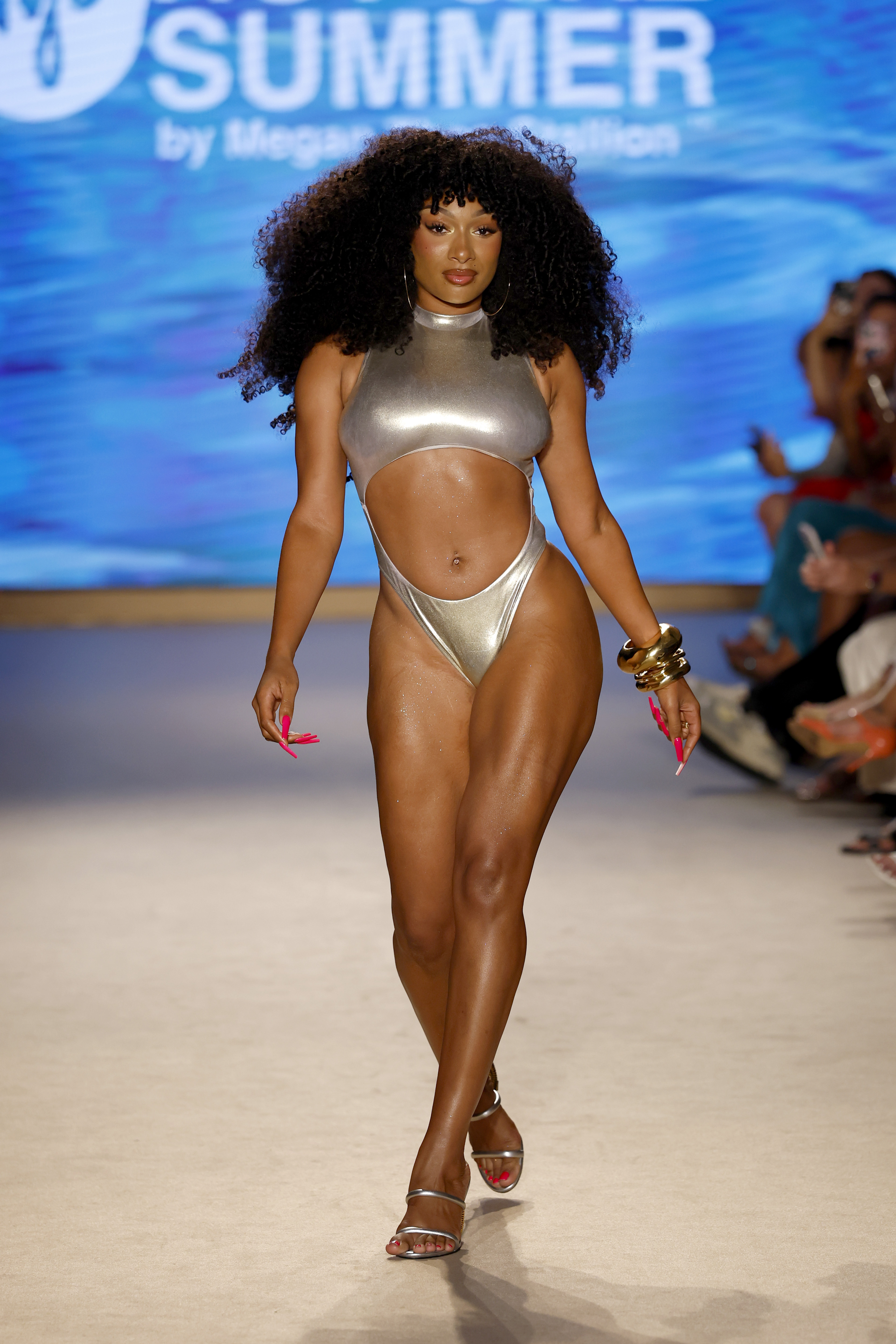 Megan Thee Stallion wore another cut-out-heavy swimsuit at Miami Swim Week in 2025