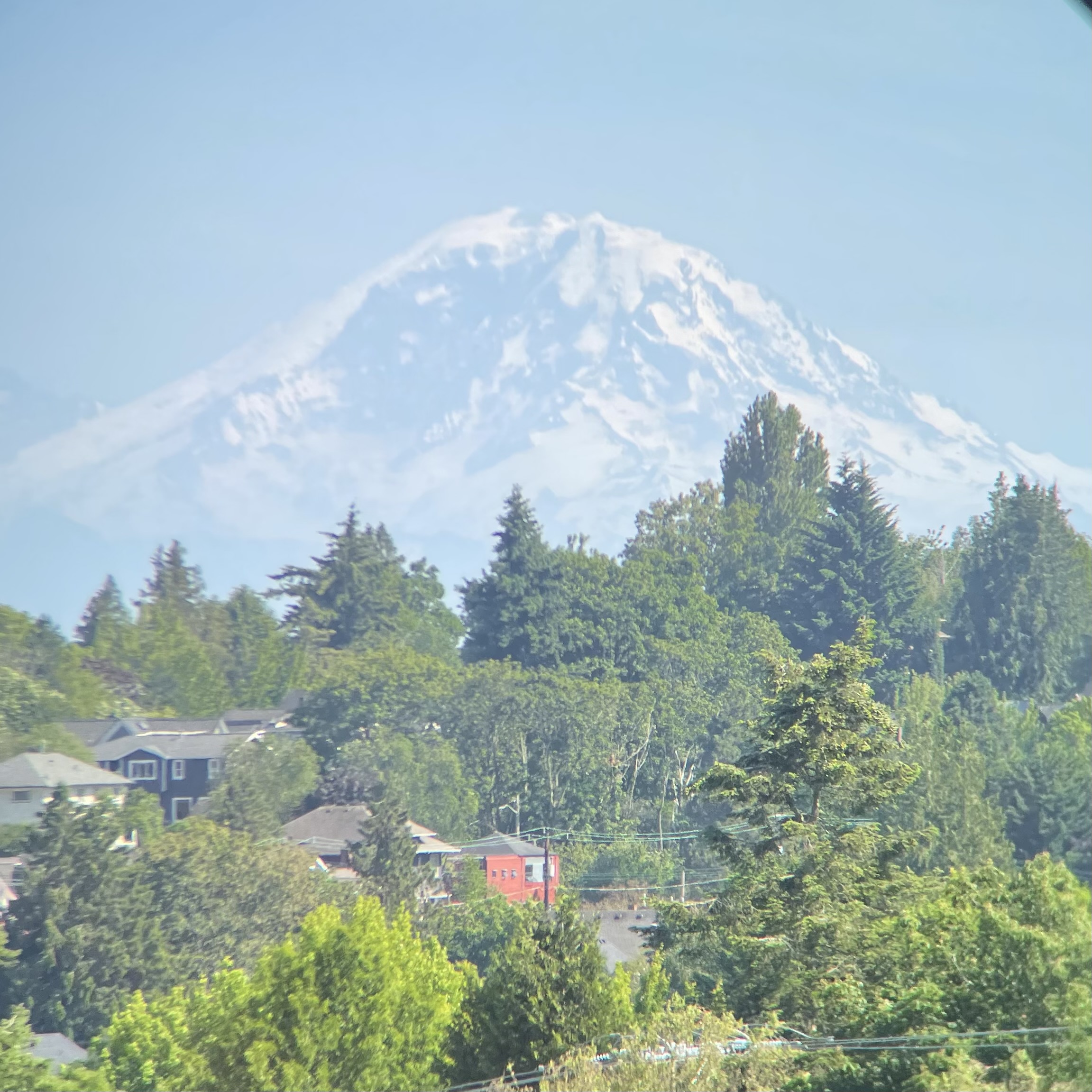 Close-up photo shot with the Nocs Zero Tube and an iPhone 12 Mini showing Mount Rainier from 70 miles away