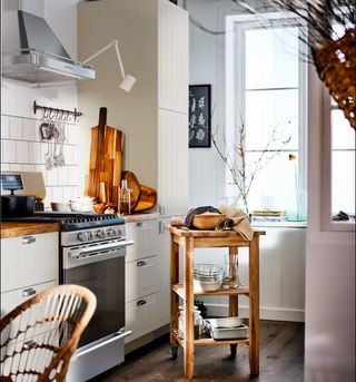 IKEA apartment kitchen with trolley for extra storage