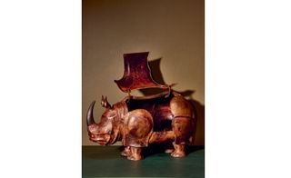 A copper rhinoceros box